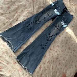 y2k flare lace up butterfly jeans